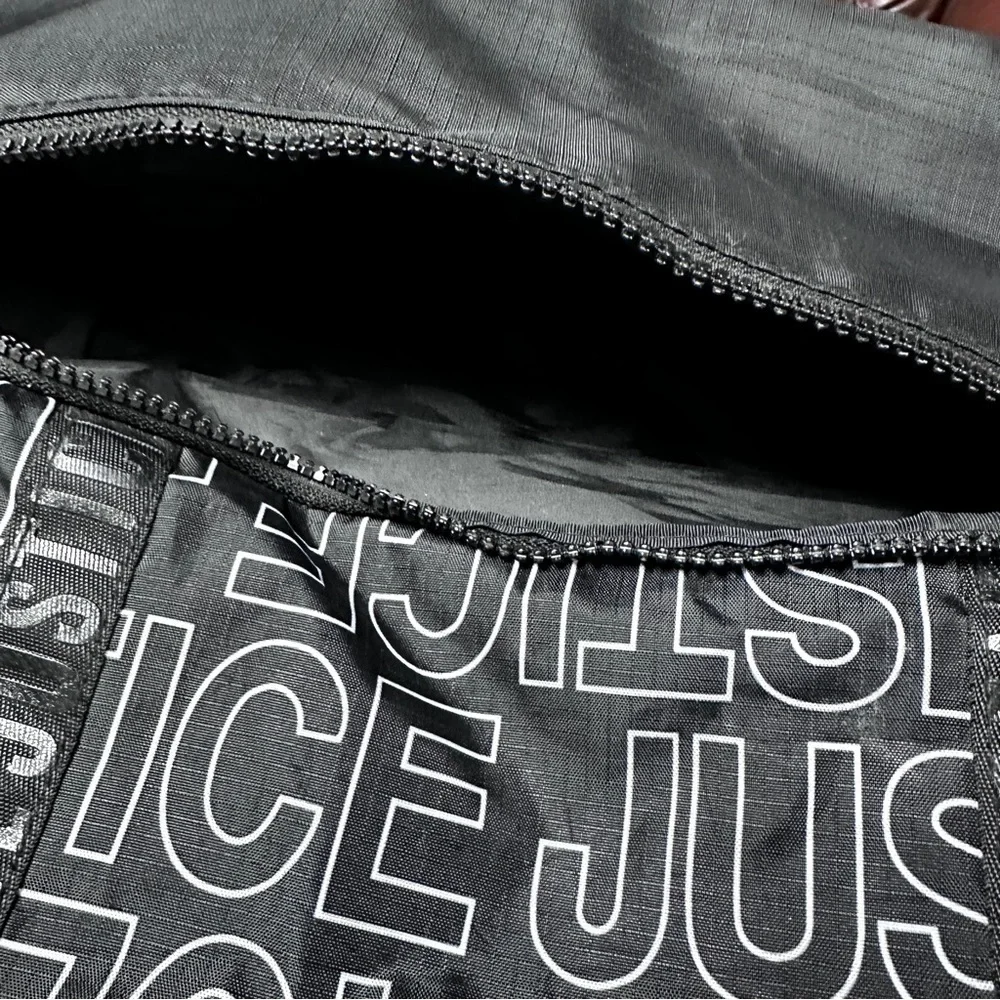 Justice logo black drawstring tote bag overnight dance / sports rucksack  Tote